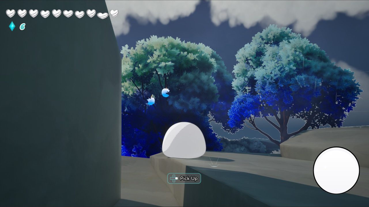 Juicicora gameplay: a small glossy creature on chalk cliffs under hand-painted trees
